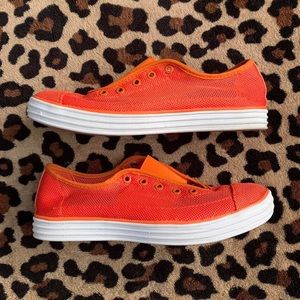 Nine West neon orange slip on sneakers